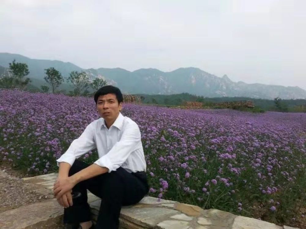 周骞老师患病前照片。（长沙理工大学供图）